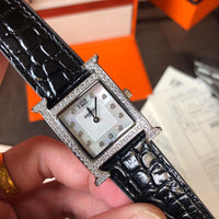 W-watch h.e.r.m.e.s Heure H watch, 21 x 21 mm Steel watch with sunburst stamped motif
