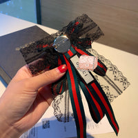 A-accessories gucci Multi-layered bow-knitted brooch bee cravat