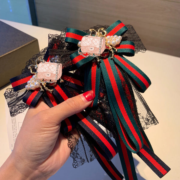 A-accessories gucci Multi-layered bow-knitted brooch bee cravat