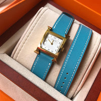 W-watch h.e.r.m.e.s Heure H watch, 21 x 21 mm Yellow-gold plated steel watch with sunburst stamped motif