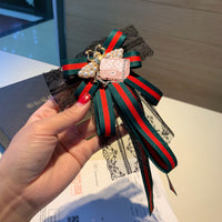 A-accessories gucci Multi-layered bow-knitted brooch bee cravat