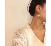 J-jewelry Celine Womens Gold Knotted Hoop Post Earrings with Pearl
