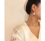 J-jewelry Celine Womens Gold Knotted Hoop Post Earrings with Pearl