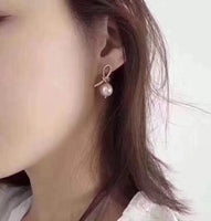 J-jewelry Celine Womens Gold Knotted Hoop Post Earrings with Pearl