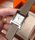 W-watch h.e.r.m.e.s Heure H watch, 21 x 21 mm Yellow-gold plated steel watch with sunburst stamped motif