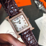 W-watch h.e.r.m.e.s Heure H watch, 21 x 21 mm Steel watch with sunburst stamped motif