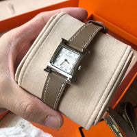W-watch h.e.r.m.e.s Heure H watch, 21 x 21 mm Yellow-gold plated steel watch with sunburst stamped motif