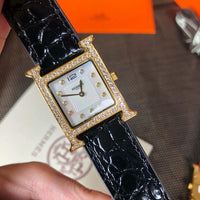 W-watch h.e.r.m.e.s Heure H watch, 21 x 21 mm Steel watch with sunburst stamped motif