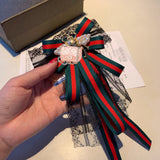 A-accessories gucci Multi-layered bow-knitted brooch bee cravat