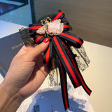 A-accessories gucci Multi-layered bow-knitted brooch bee cravat