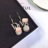 J-jewelry Dior Womens Classic Double Linear Loops Design Twist Wave Earrings for Women