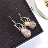 J-jewelry Dior Womens Classic Double Linear Loops Design Twist Wave Earrings for Women